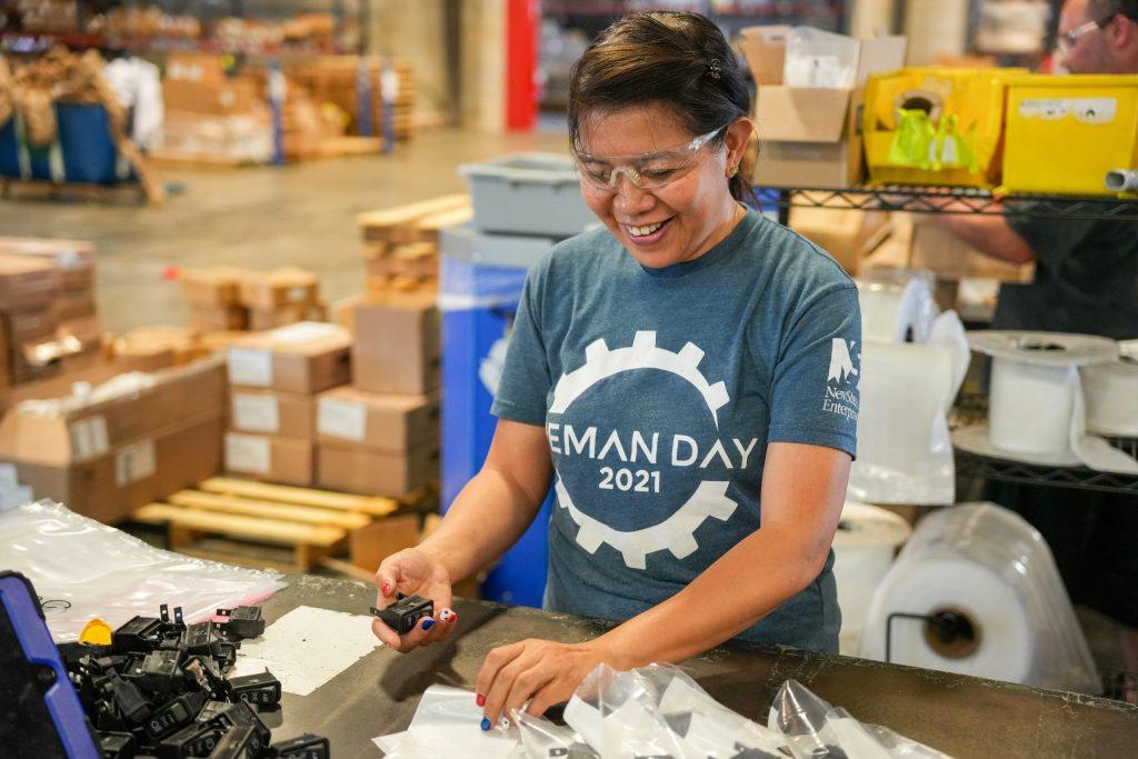 NewStream employee working in the warehouse
